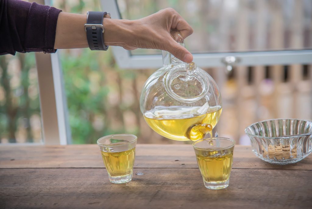 happy-man-drink-hot-tea-cup-asian-people-with-hot-tea-drink-relax-concept